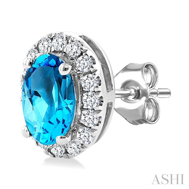 5x3 MM Oval Shape Blue Topaz and 1/8 Ctw Round Cut Diamond Halo Semi-Precious Stud Earrings in 14K White Gold