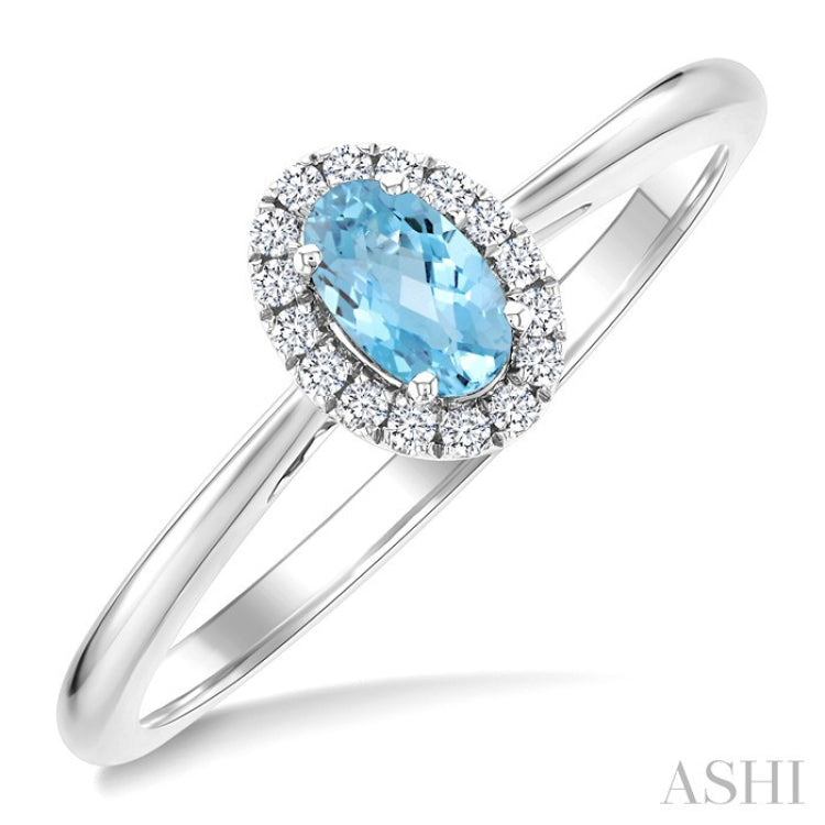 5x3 MM Oval Shape Aquamarine and 1/20 Ctw Round Cut Diamond Halo Semi-Precious Ring in 10K White Gold