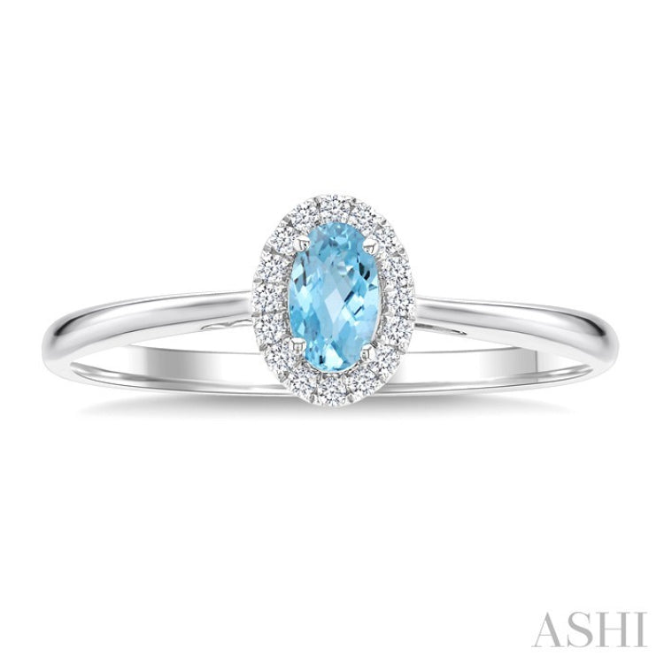 5x3 MM Oval Shape Aquamarine and 1/20 Ctw Round Cut Diamond Halo Semi-Precious Ring in 10K White Gold