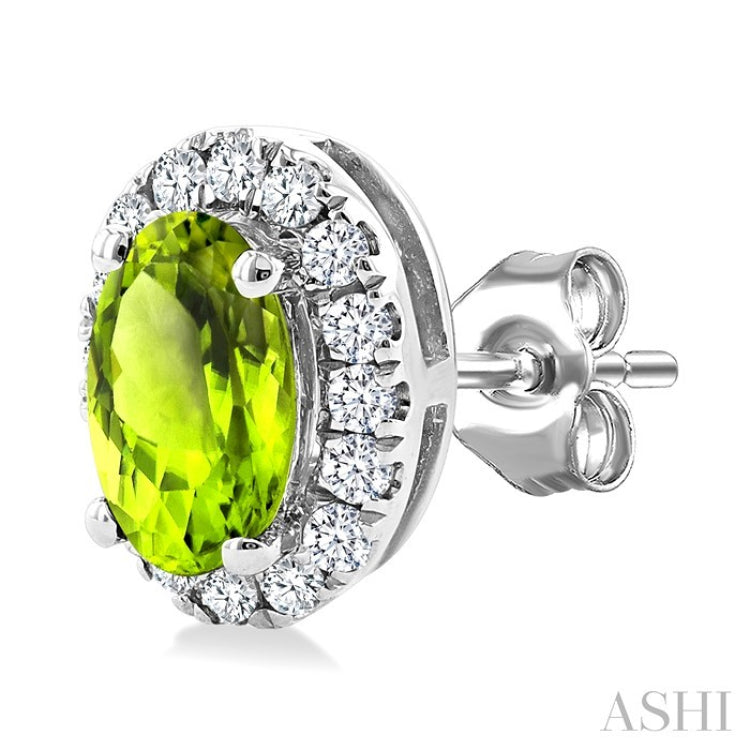 5x3 MM Oval Shape Peridot and 1/8 Ctw Round Cut Diamond Halo Semi-Precious Stud Earrings in 14K White Gold
