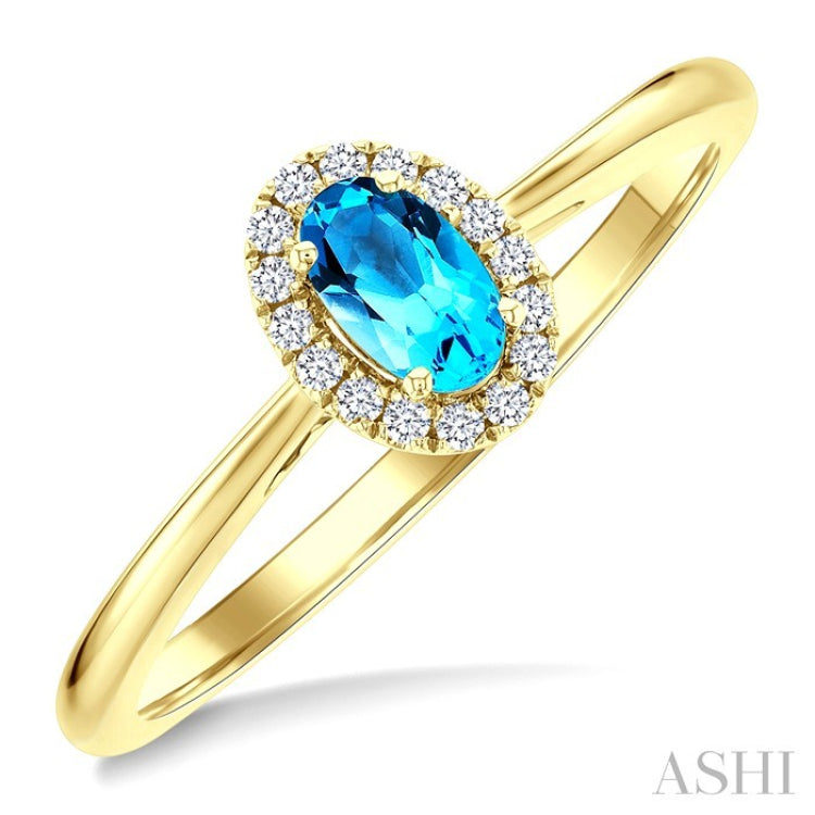 5x3 MM Oval Shape Blue Topaz and 1/20 Ctw Round Cut Diamond Halo Semi-Precious Ring in 10K Yellow Gold
