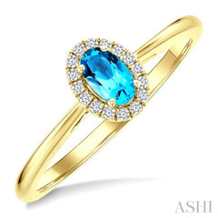 5x3 MM Oval Shape Blue Topaz and 1/20 Ctw Round Cut Diamond Halo Semi-Precious Ring in 10K Yellow Gold