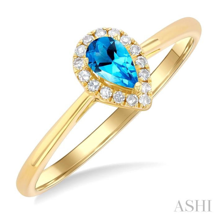 5x3 MM Pear Shape Blue Topaz and 1/20 Ctw Single Cut Diamond Halo Semi-Precious Ring in 14K Yellow Gold