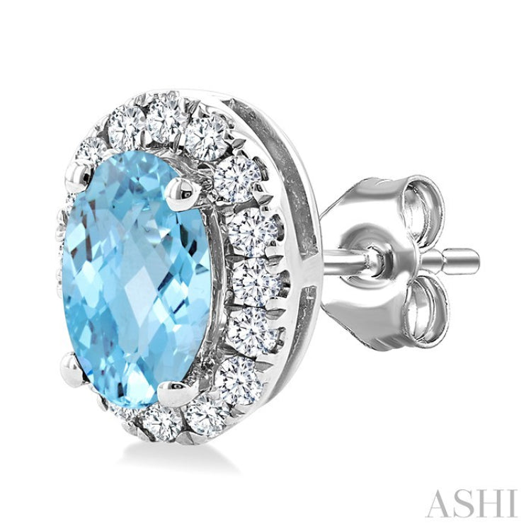 5x3 MM Oval Shape Aquamarine and 1/8 Ctw Round Cut Diamond Halo Semi-Precious Stud Earrings in 10K White Gold
