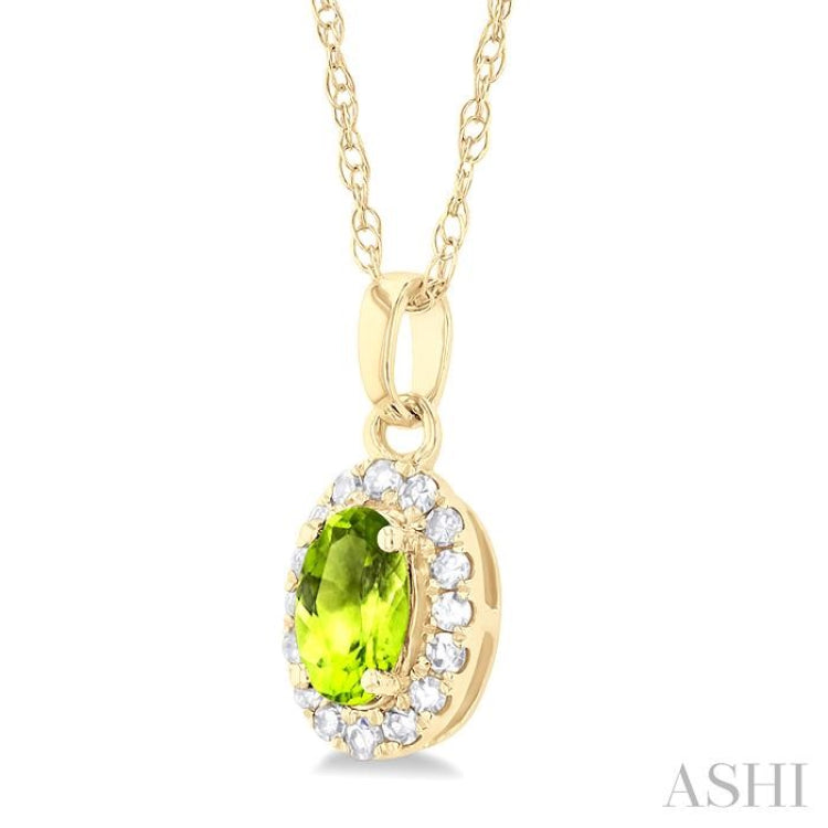 5x3 MM Oval Shape Peridot and 1/20 Ctw Single Cut Diamond Halo Semi-Precious Pendant with Chain in 14K Yellow Gold