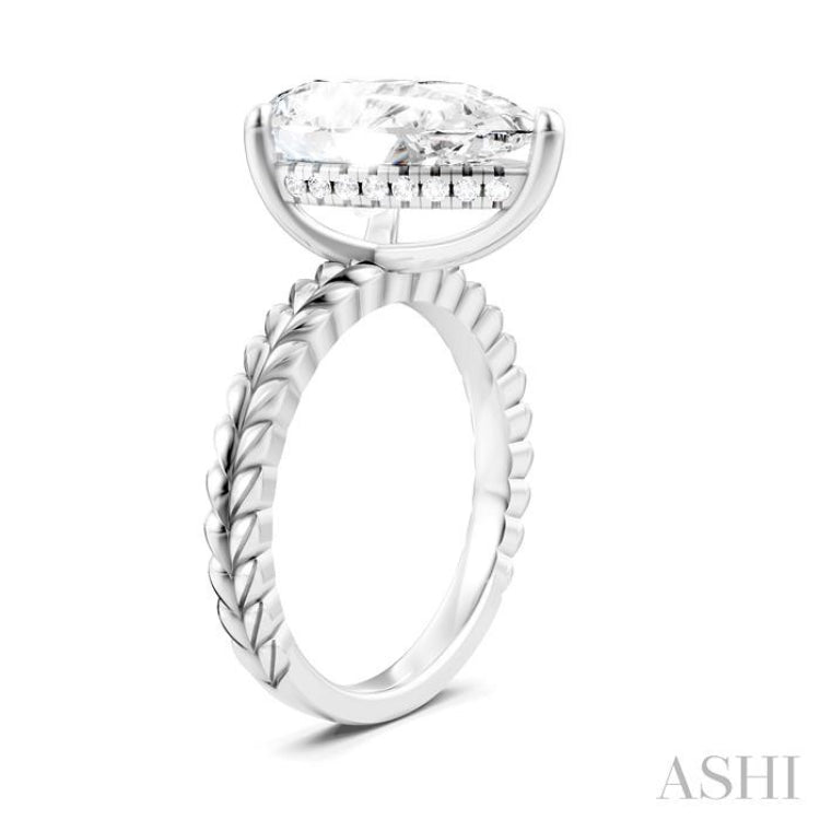 1/8 Ctw Pear Shape Round Cut Diamond Semi-Mount Engagement Ring in 14K White Gold