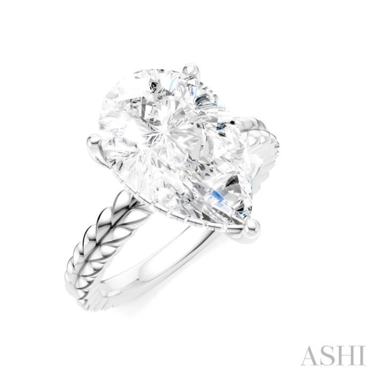 1/8 Ctw Pear Shape Round Cut Diamond Semi-Mount Engagement Ring in 14K White Gold