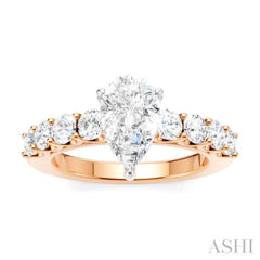 7/8 Ctw Pear Shape Round Cut Diamond Semi-Mount Engagement Ring in 14K Rose and White Gold