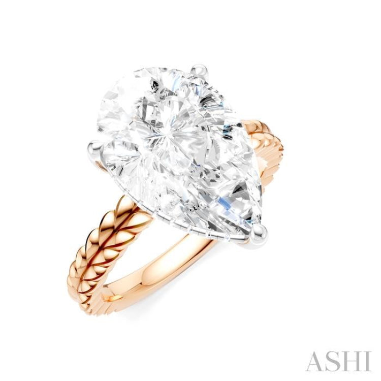 1/8 Ctw Pear Shape Round Cut Diamond Semi-Mount Engagement Ring in 14K Rose and White Gold