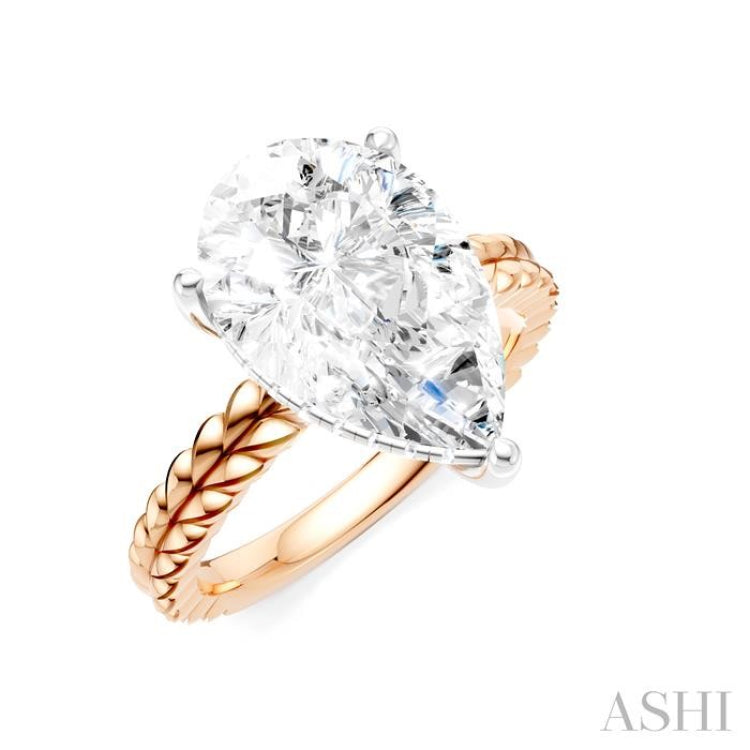 1/8 Ctw Pear Shape Round Cut Diamond Semi-Mount Engagement Ring in 14K Rose and White Gold