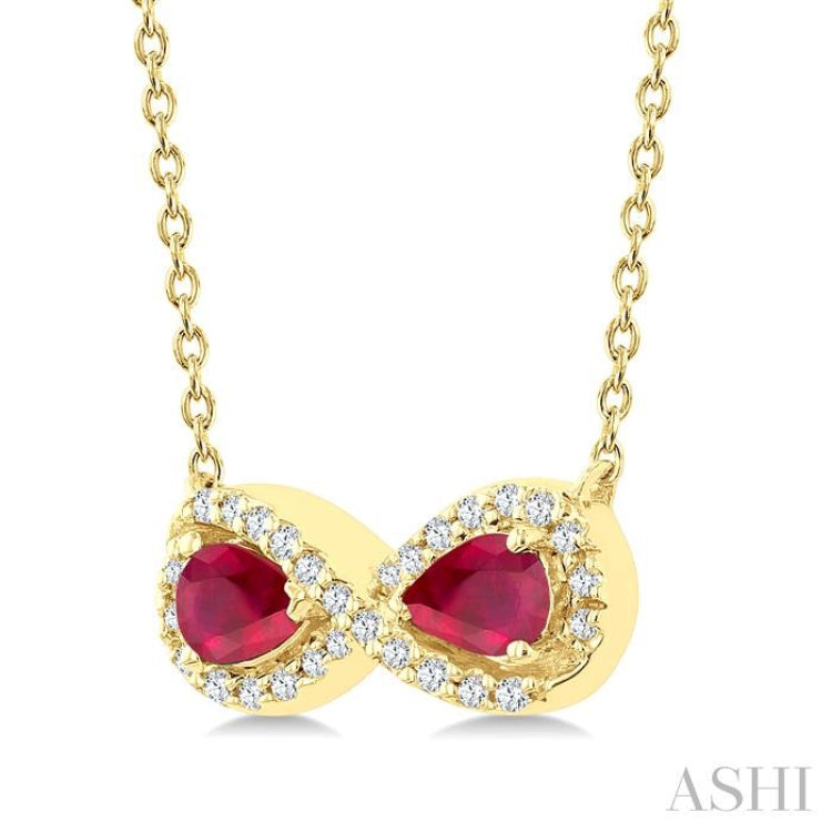 4X3 MM Pear Shape Ruby and 1/10 Ctw Round Cut Diamond Precious Infinite Halo Pendant With Chain in 10K Yellow Gold