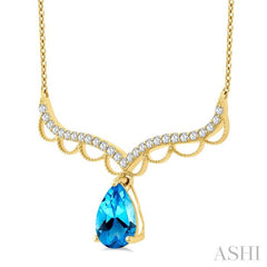 9X6 MM Pear Cut Blue Topaz and Round Cut 1/5 Ctw Diamond Semi-Precious Fashion Necklace in 10K Yellow Gold