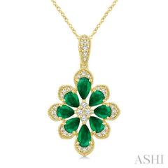 1/6 Ctw Floral Motif 5X3MM & 4X3MM Pear Cut Emerald and Round Cut Diamond Precious Pendant With Chain in 10K Yellow Gold