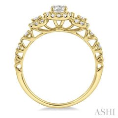 1/2 Ctw Round Cut Diamond Engagement Ring with 1/5 Ct Round Cut Center Stone in 14K Yellow Gold