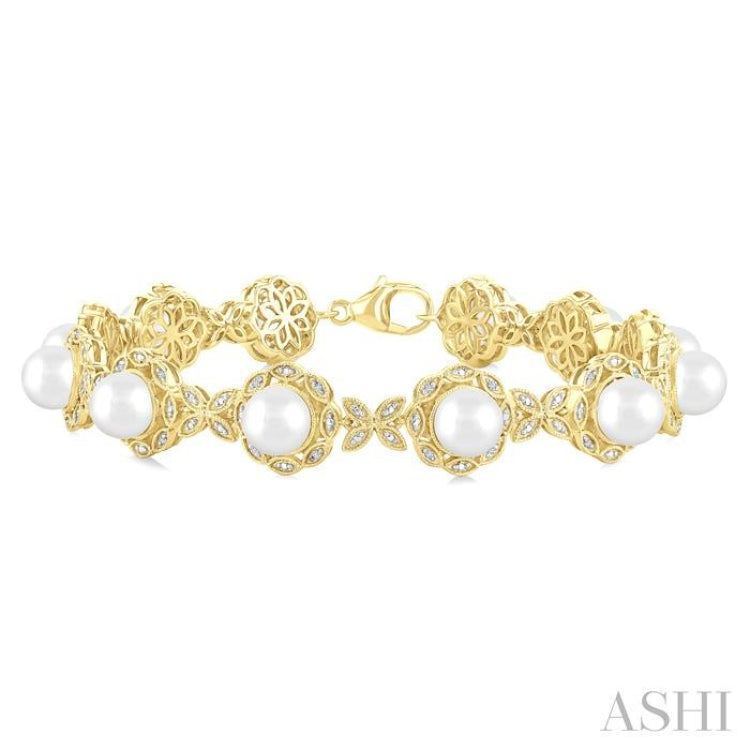 6 MM Cultured Pearl and 1/6 Ctw Round Cut Diamond Bracelet in Yellow Gold Vermeil