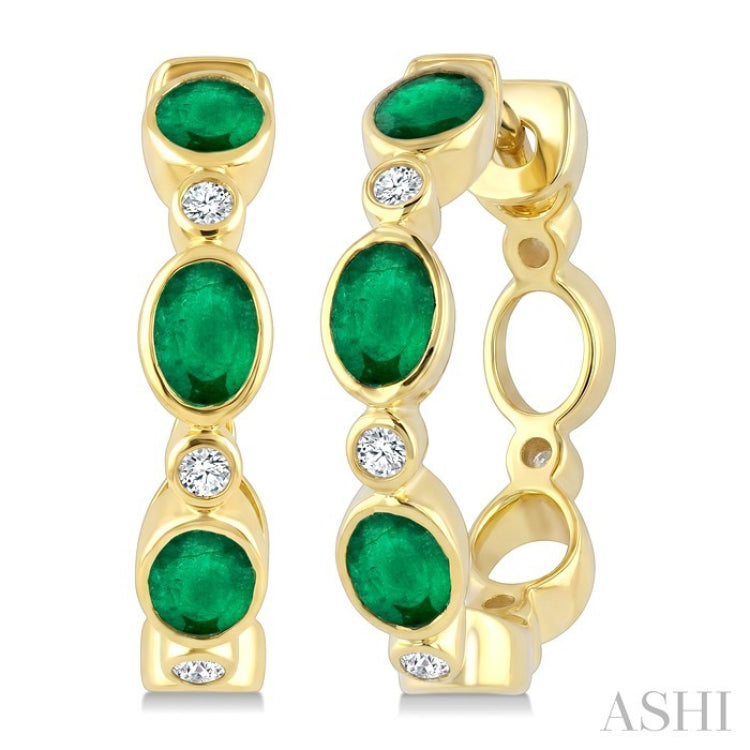 4X3 MM Oval Shape Emerald and 1/20 Ctw Bezel Set Round Cut Diamond Fashion Hoop Earrings in 10K Yellow Gold