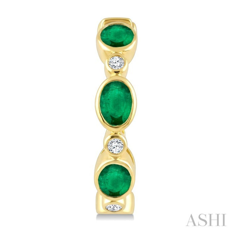 4X3 MM Oval Shape Emerald and 1/20 Ctw Bezel Set Round Cut Diamond Fashion Hoop Earrings in 10K Yellow Gold