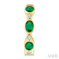 4X3 MM Oval Shape Emerald and 1/20 Ctw Bezel Set Round Cut Diamond Fashion Hoop Earrings in 10K Yellow Gold