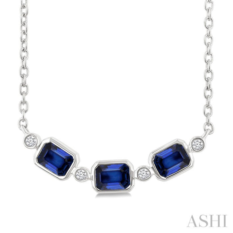 4X3MM Emerald Cut Sapphire and 1/50 Ctw Bezel Set Round Cut Diamond Precious Fashion Necklace in 10K White Gold