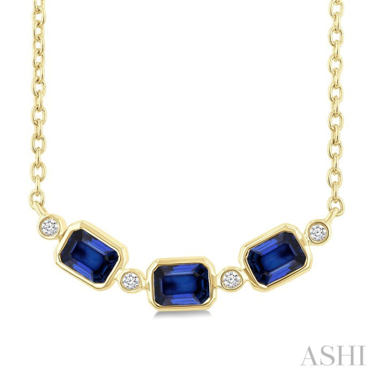 4X3MM Emerald Cut Sapphire and 1/50 Ctw Bezel Set Round Cut Diamond Precious Fashion Necklace in 10K Yellow Gold
