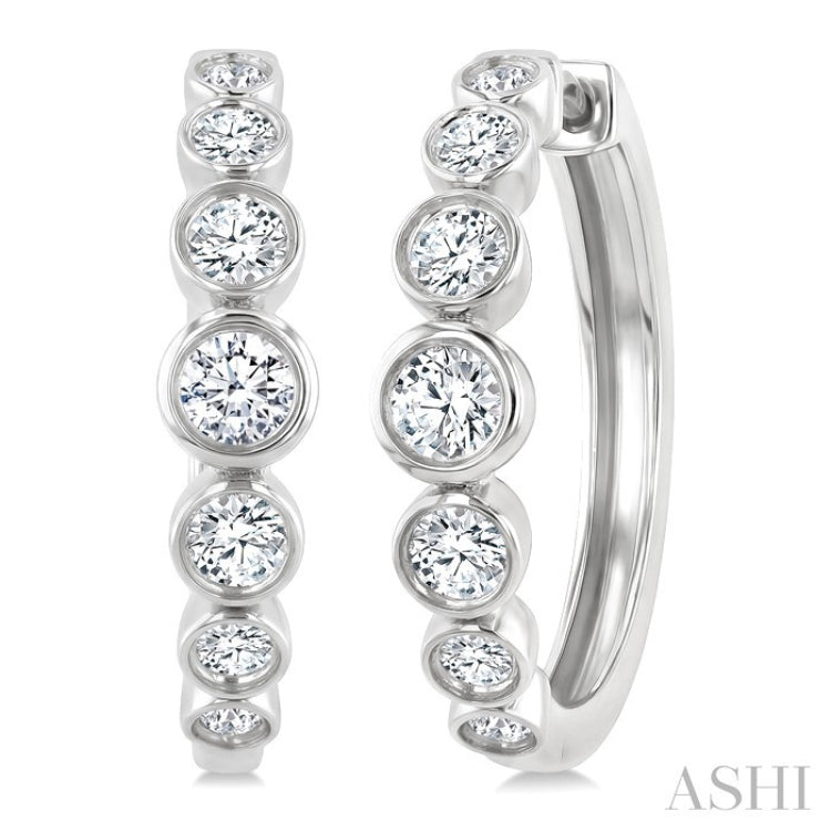 1 1/10 Ctw Graduated Bezel Set Round Cut Diamond Fashion Hoop Earrings in 14K White Gold