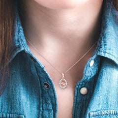 6x4 MM Oval Cut Morganite Center Sunflower and 1/8 Ctw Round Cut Diamond Semi-Precious Pendant in 10K Rose Gold with chain