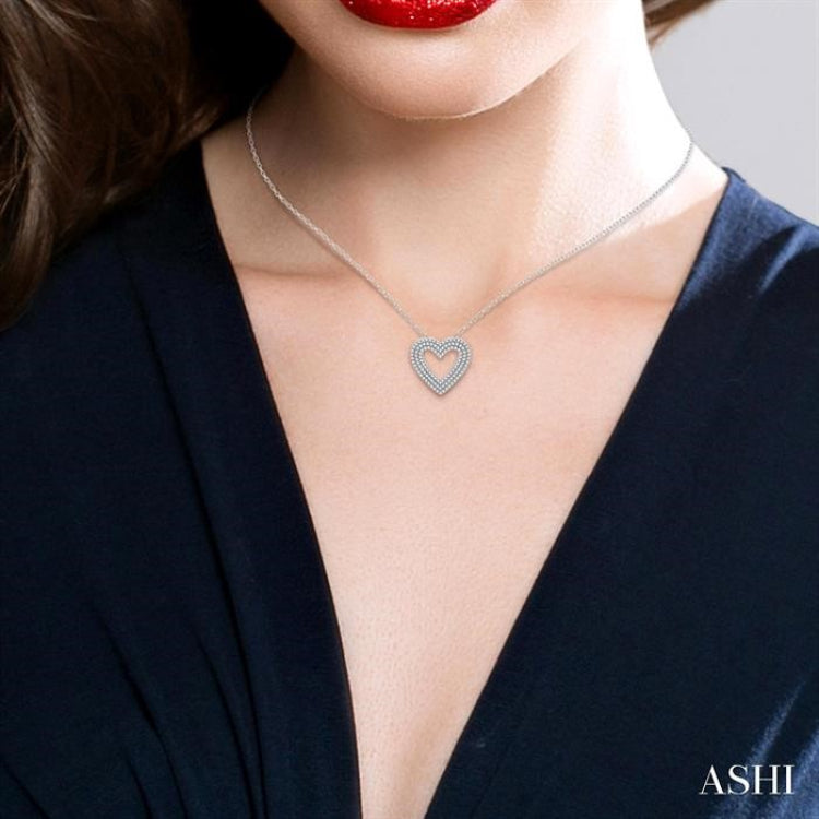 3/8 Ctw Heart Shape Triple Row Round Cut Diamond Fashion Pendant With Chain in 10K White Gold